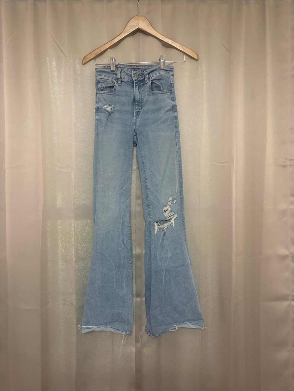 Women’s Light Blue Distressed Flare Jeans